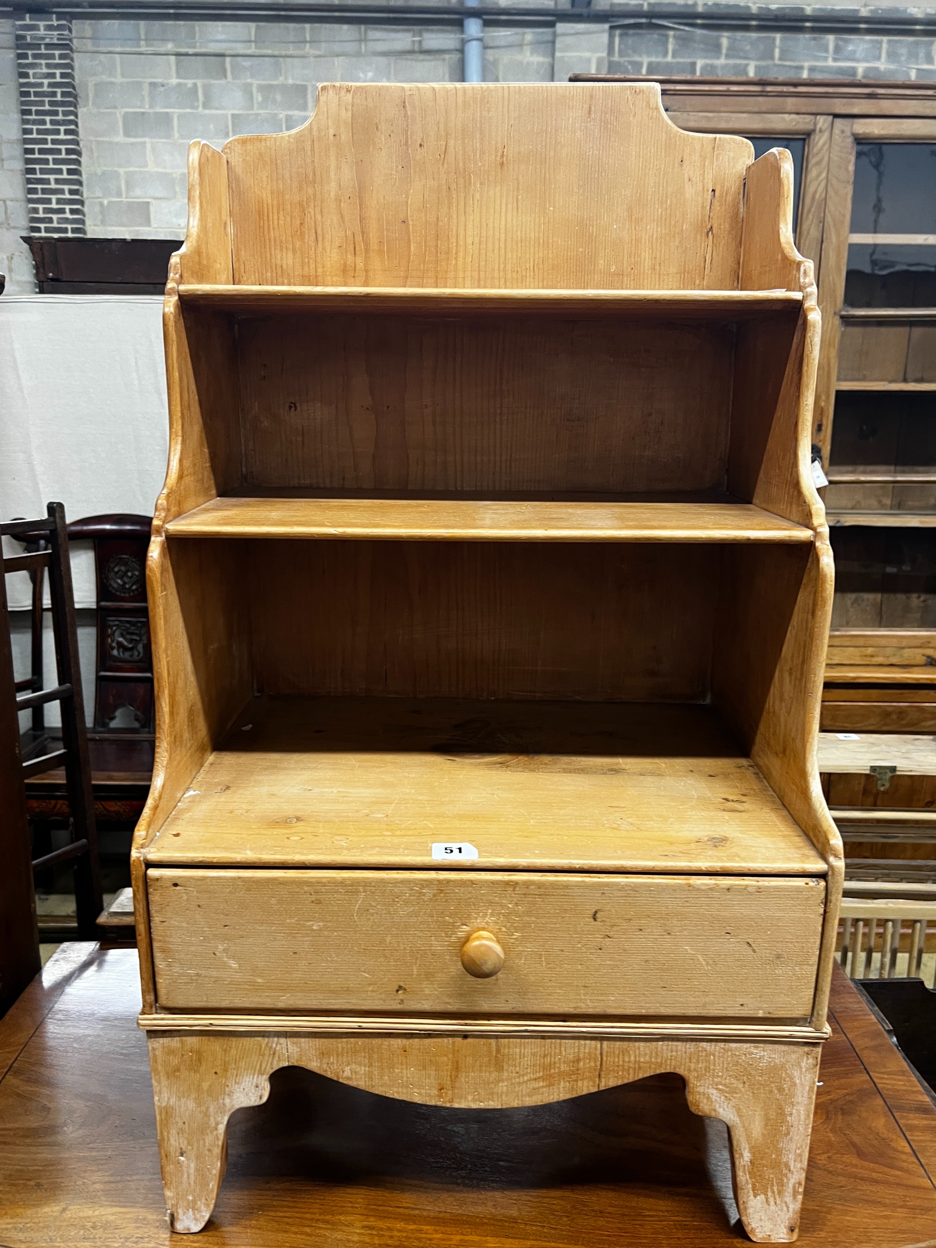 A small 19th centurty pine graduated open bookcase, length 49cm, depth 35cm, height 90cm